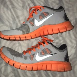 Orange Nike FREE RUNS